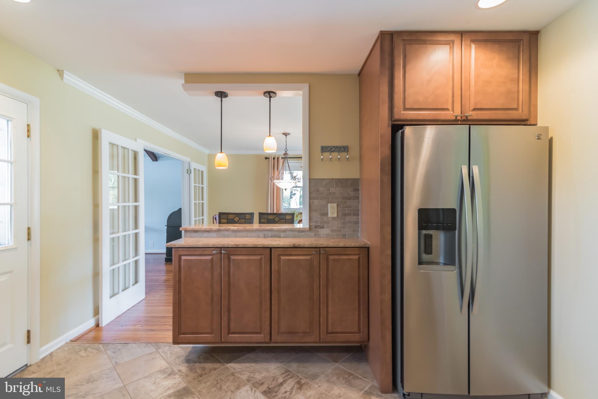 1376 Michael Road Jenkintown, PA 19046 - Photo 8 of 30 a kitchen with stainless steel appliances granite countertop a refrigerator and a sink