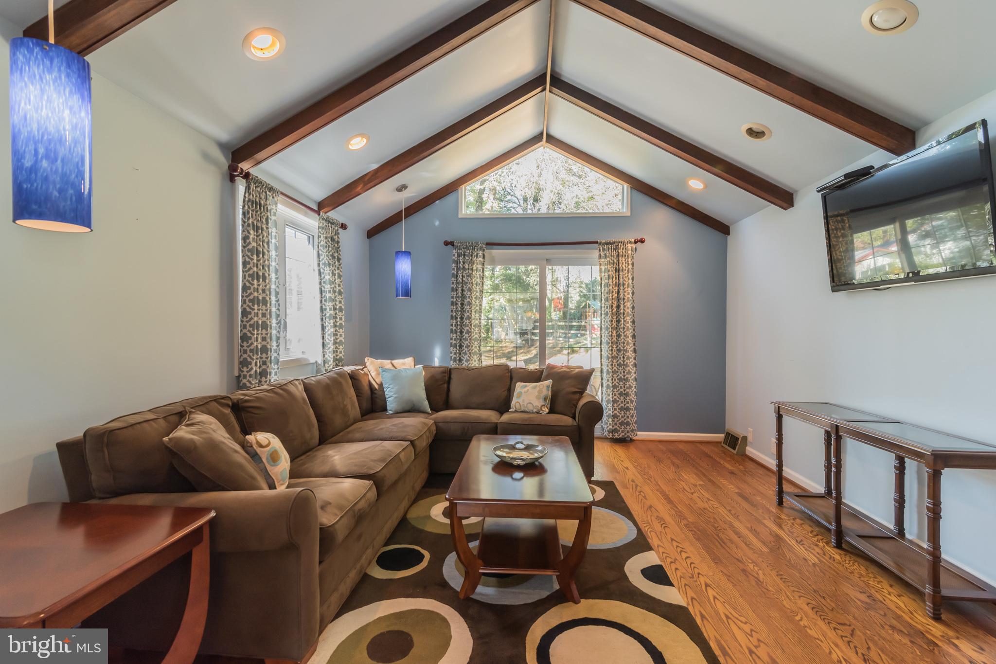 1376 Michael Road Jenkintown, PA 19046 - Photo 10 of 30 a living room with furniture a window and a chandelier