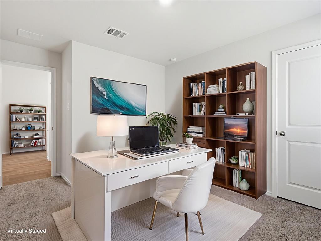 757 Tiger Lily Way Pilot Point, TX 76258 - Photo 12 of 16 a workspace with furniture and bookshelf