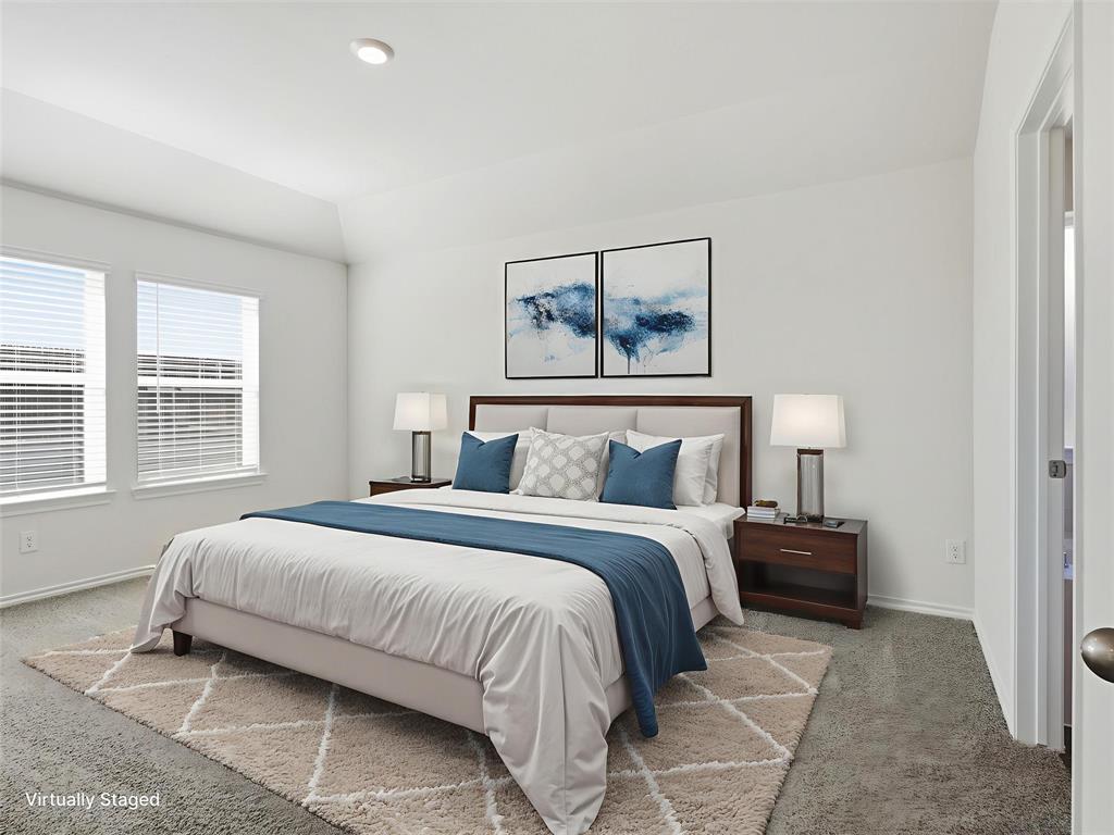 757 Tiger Lily Way Pilot Point, TX 76258 - Photo 7 of 16 a bedroom with a bed and a painting on the wall