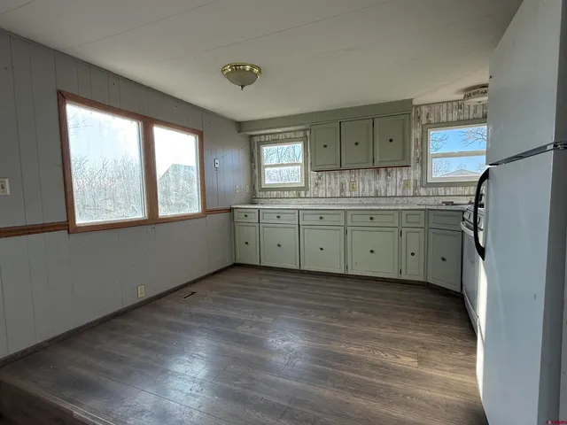 a room with a window and a sink