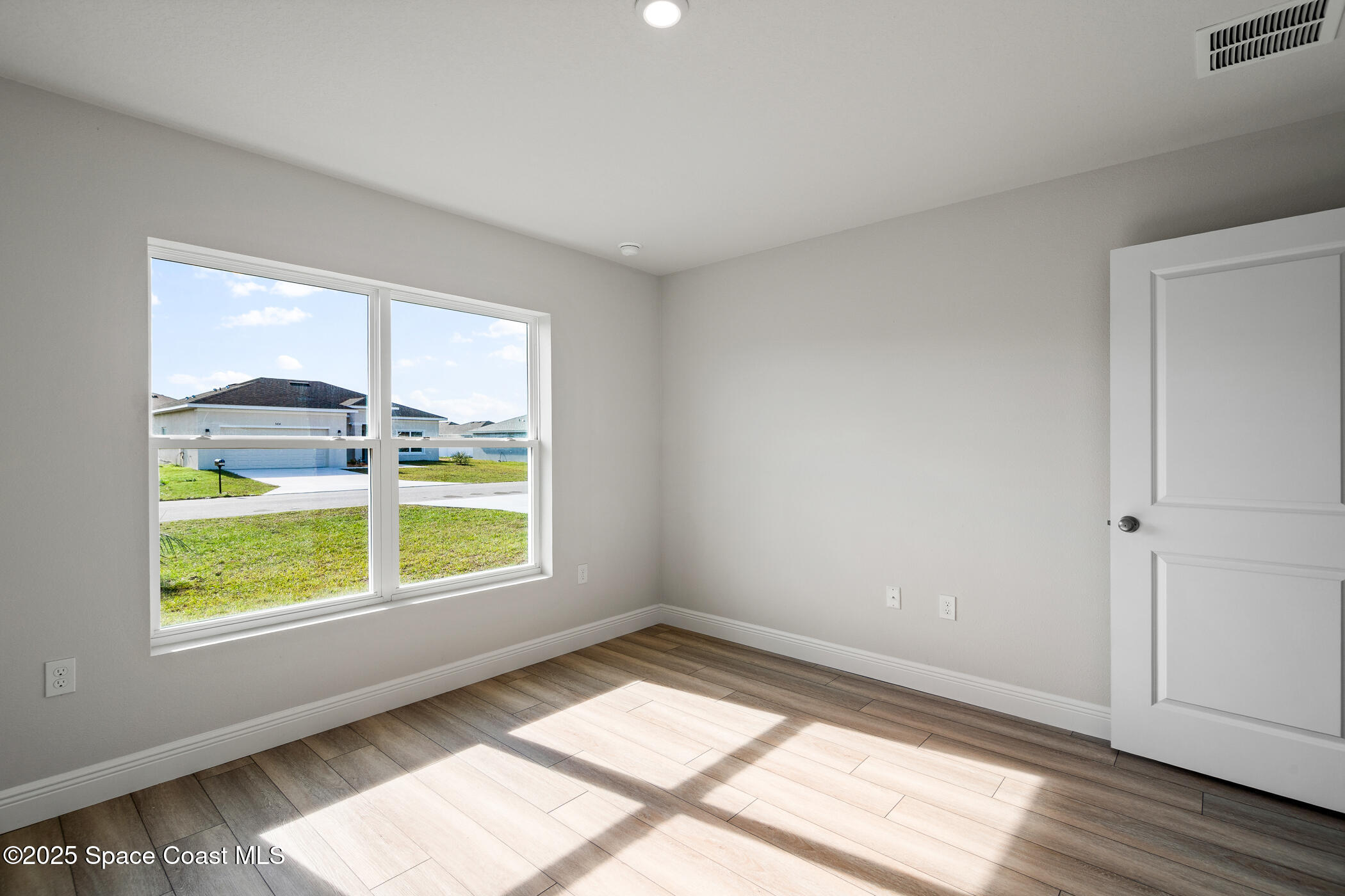 5435 Southeast 91st Street Ocala, FL 34480 - Photo 33 of 44 a view of an empty room with a window