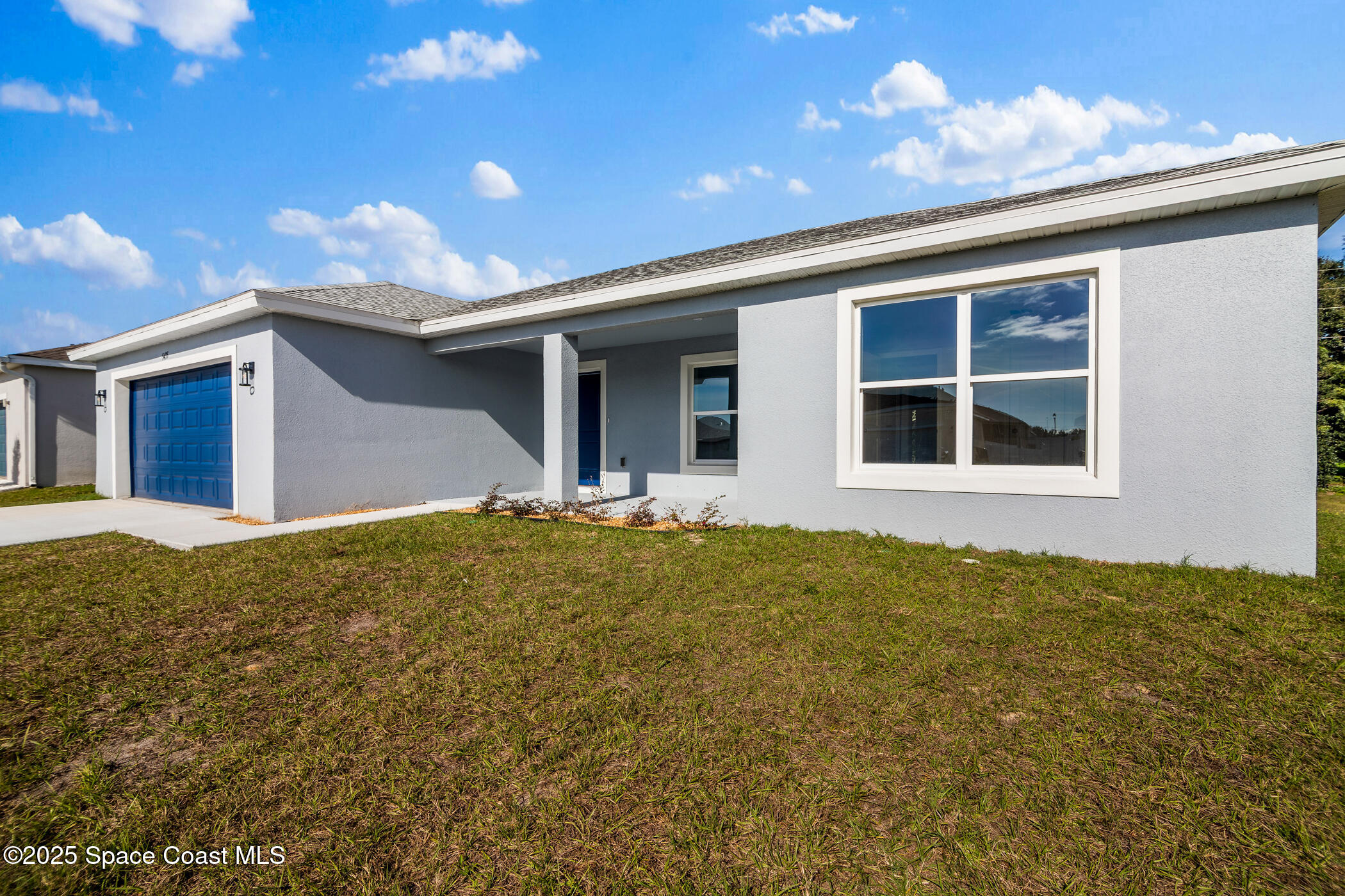 5435 Southeast 91st Street Ocala, FL 34480 - Photo 4 of 44 a view of a house with a yard