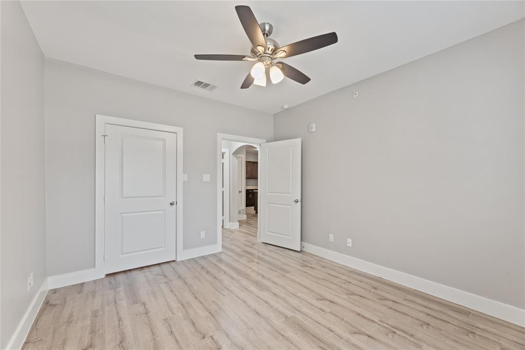13609 Pinnacle Circle West, Unit 1101 Fort Worth, TX 76040 - Photo 17 of 21 wooden floor in an empty room