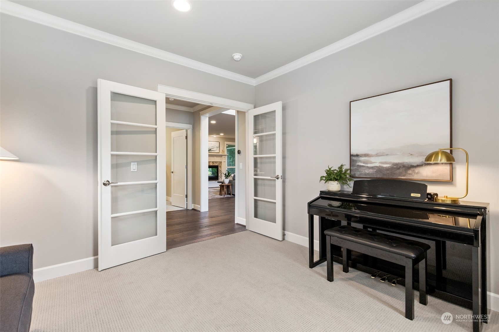 1607 233rd Street Southeast Bothell, WA 98021 - Photo 16 of 40 a living room with furniture a piano and wooden floor