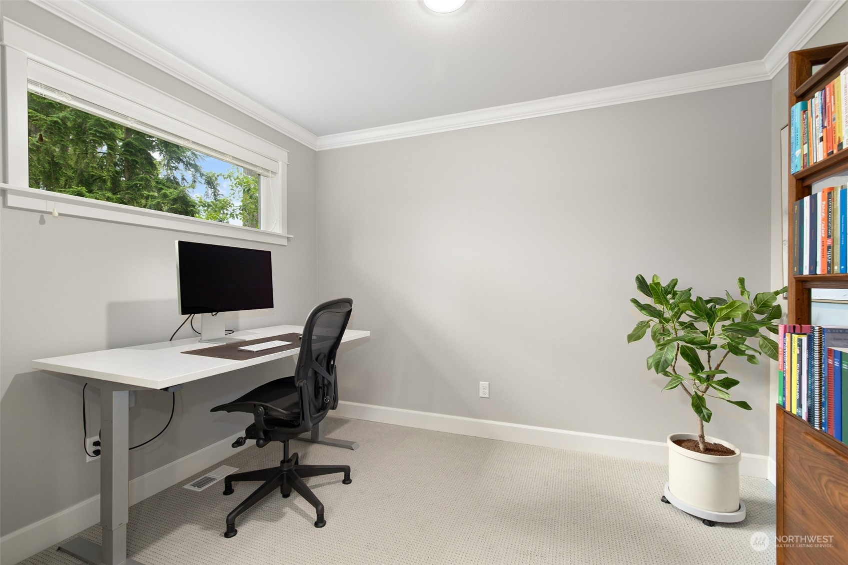 1607 233rd Street Southeast Bothell, WA 98021 - Photo 20 of 40 a view of a workspace with a window and chair in a room