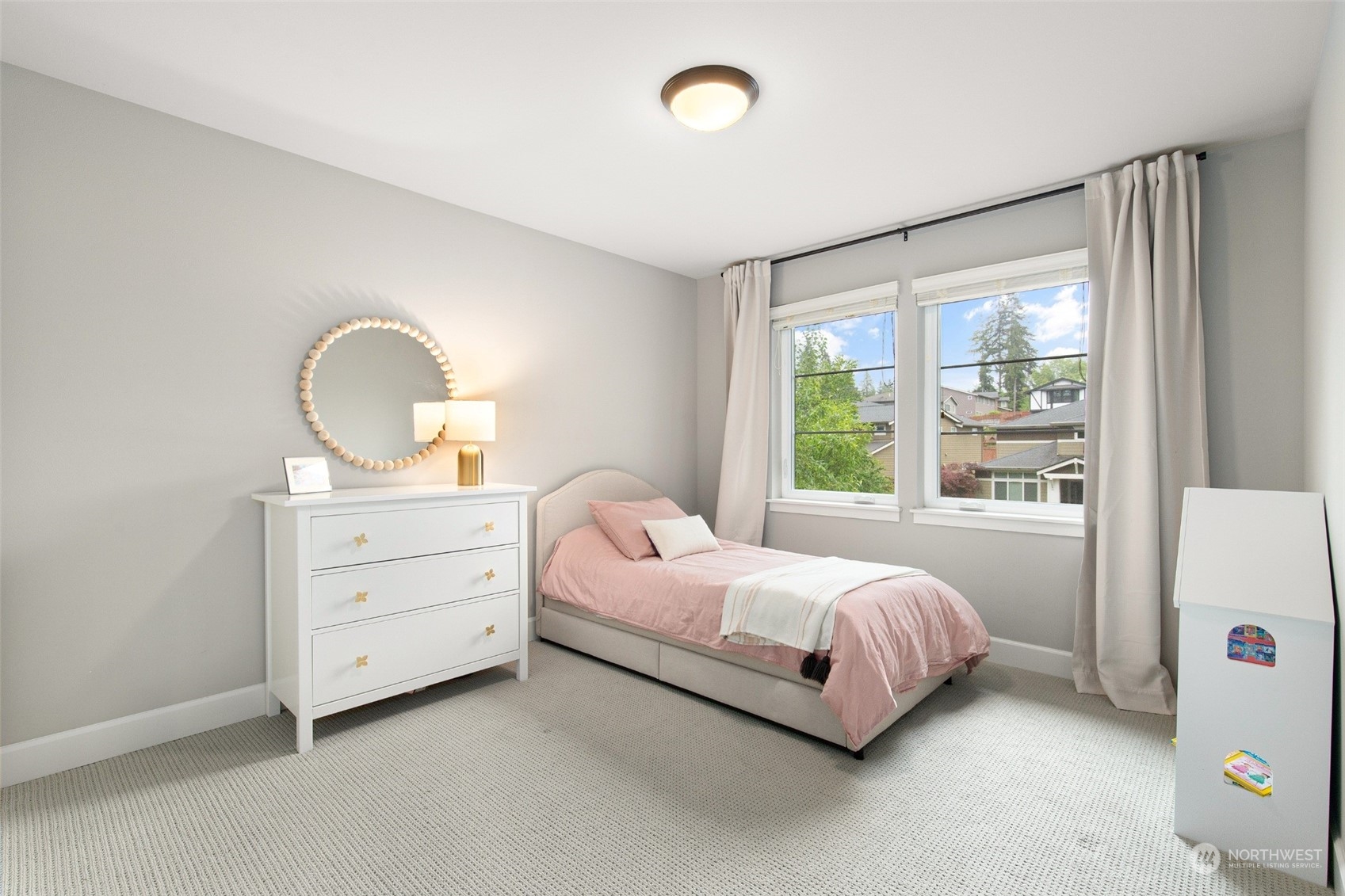 1607 233rd Street Southeast Bothell, WA 98021 - Photo 25 of 40 a bedroom with a bed and a dresser