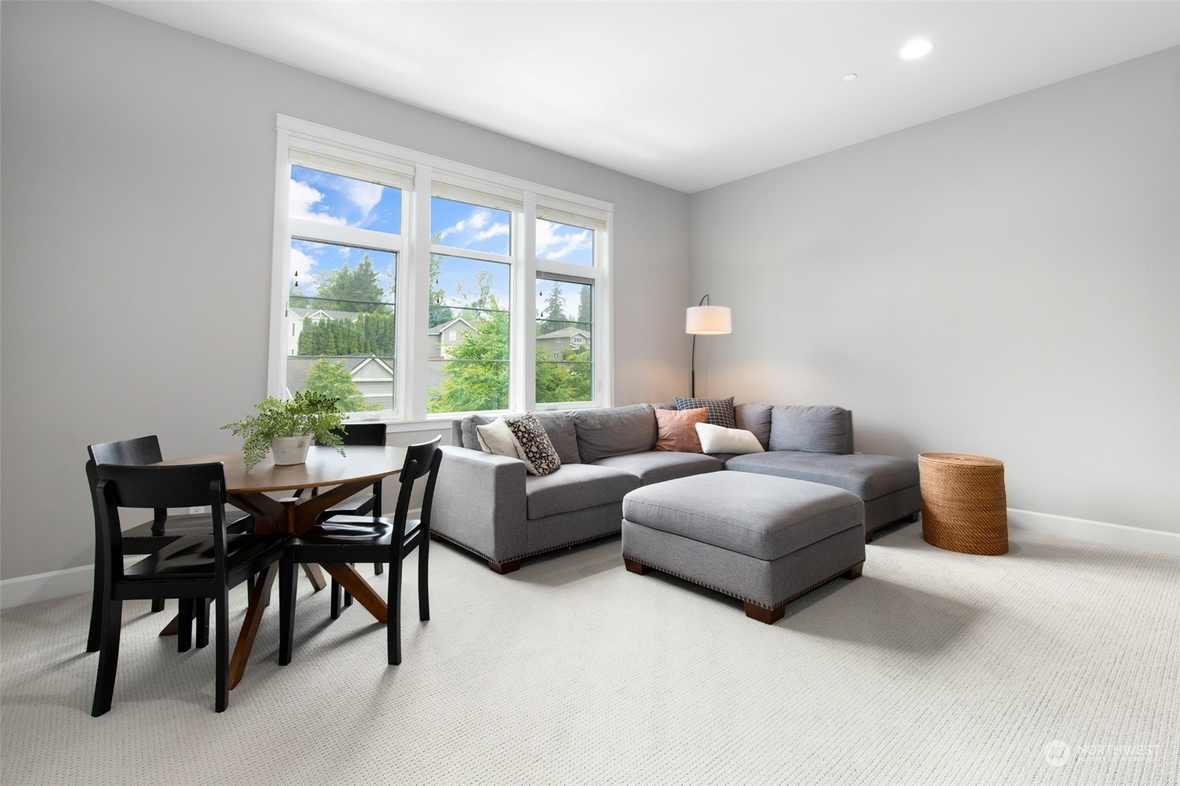 1607 233rd Street Southeast Bothell, WA 98021 - Photo 30 of 40 a living room with furniture and a large window
