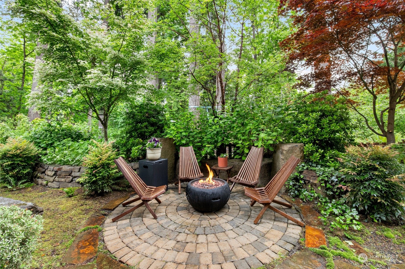 1607 233rd Street Southeast Bothell, WA 98021 - Photo 33 of 40 a view of a backyard with sitting area