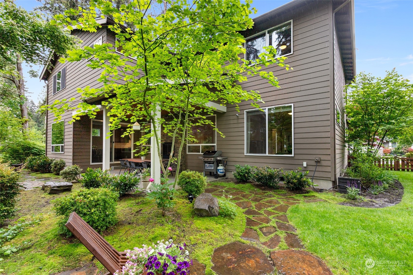 1607 233rd Street Southeast Bothell, WA 98021 - Photo 36 of 40 a front view of a house with garden