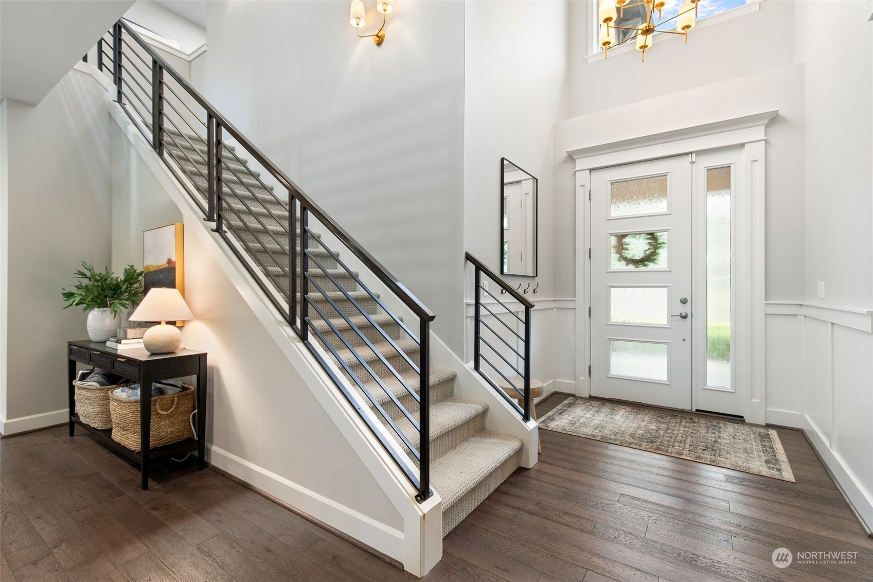 1607 233rd Street Southeast Bothell, WA 98021 - Photo 4 of 40 a view of entryway with wooden floor and stairs