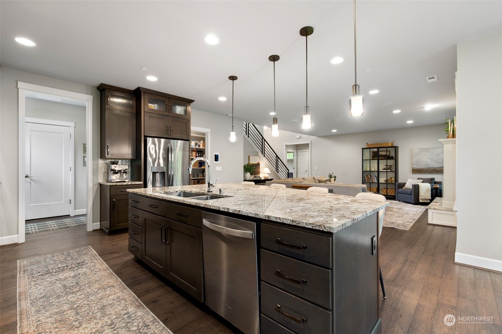 1607 233rd Street Southeast Bothell, WA 98021 - Photo 9 of 40 a bathroom with a granite countertop sink and a large mirror