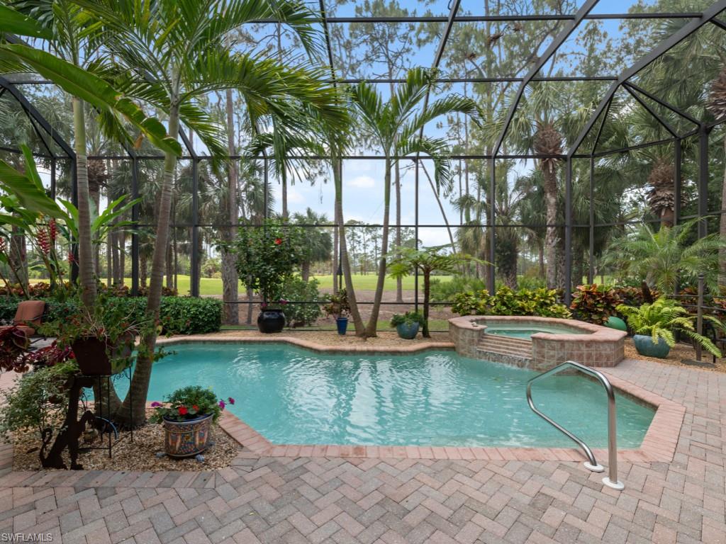 15352 Milan Lane Naples, FL 34110 - Photo 20 of 49 a view of swimming pool with a patio
