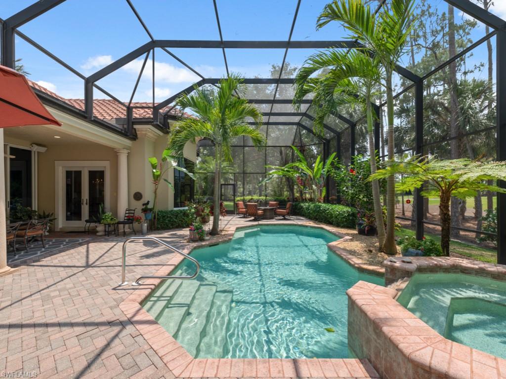 15352 Milan Lane Naples, FL 34110 - Photo 24 of 49 a view of yard with patio