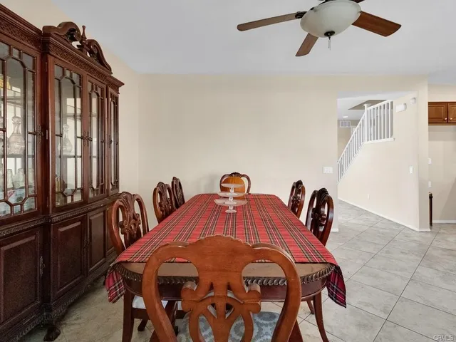 a view of a livingroom with furniture and entryway
