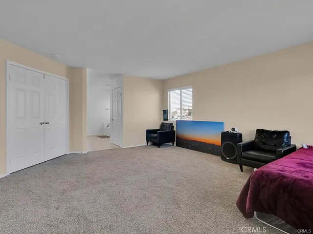 a view of garage with refrigerator