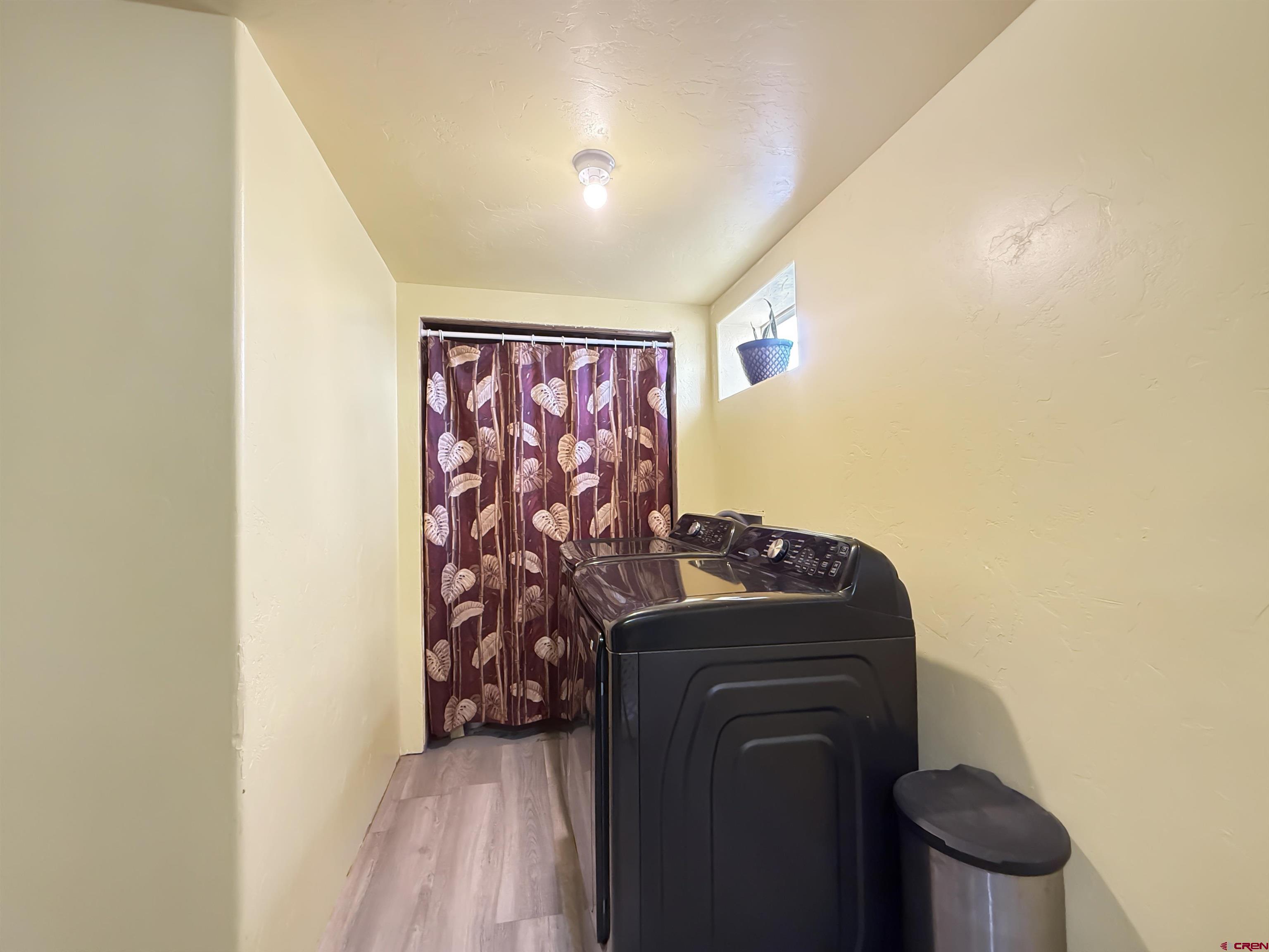 10659 3100th Road Hotchkiss, CO 81419 - Photo 25 of 40 a view of walk in closet with clothes and shoes