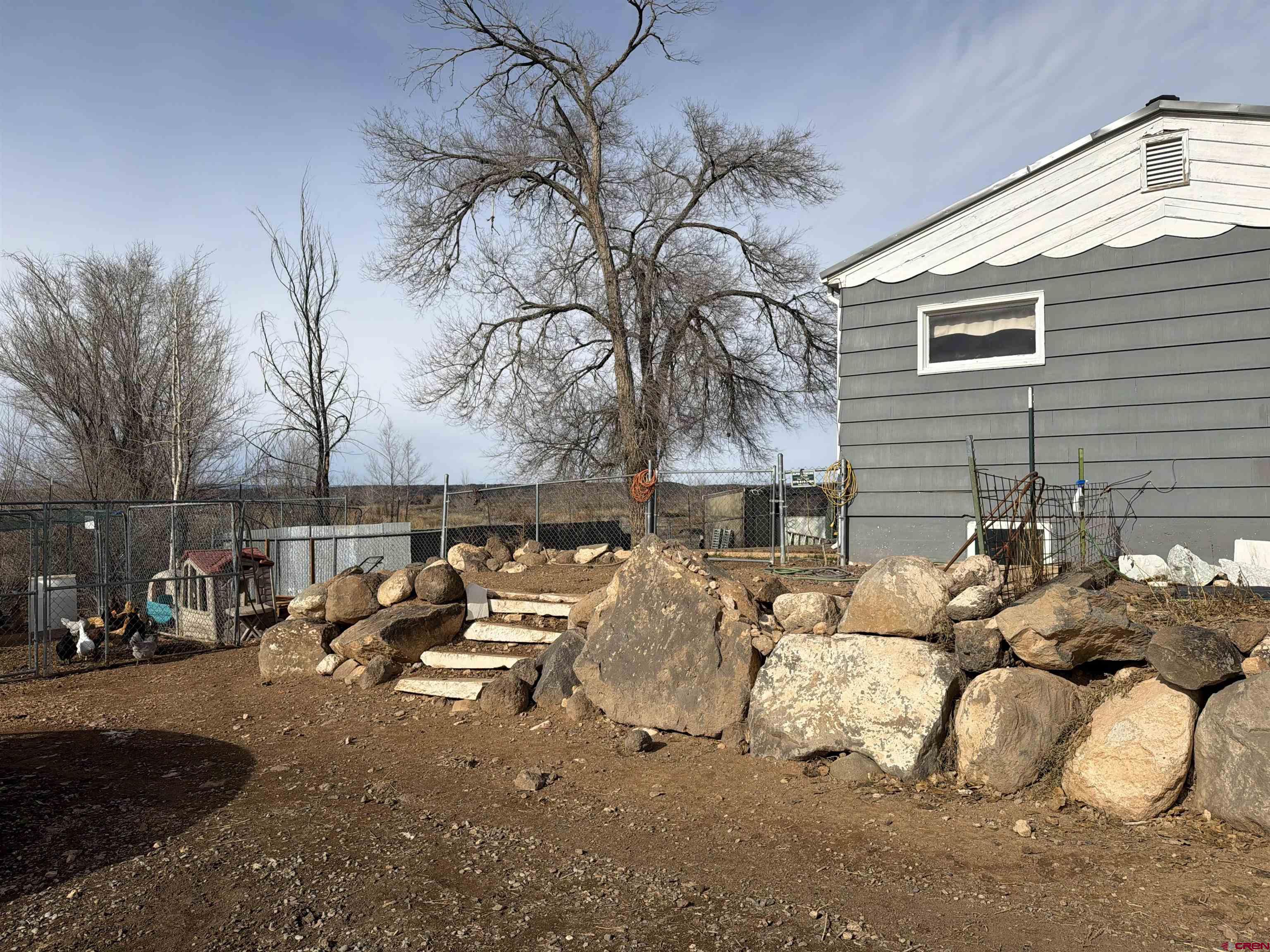 10659 3100th Road Hotchkiss, CO 81419 - Photo 36 of 40 a view of a backyard with a white bed