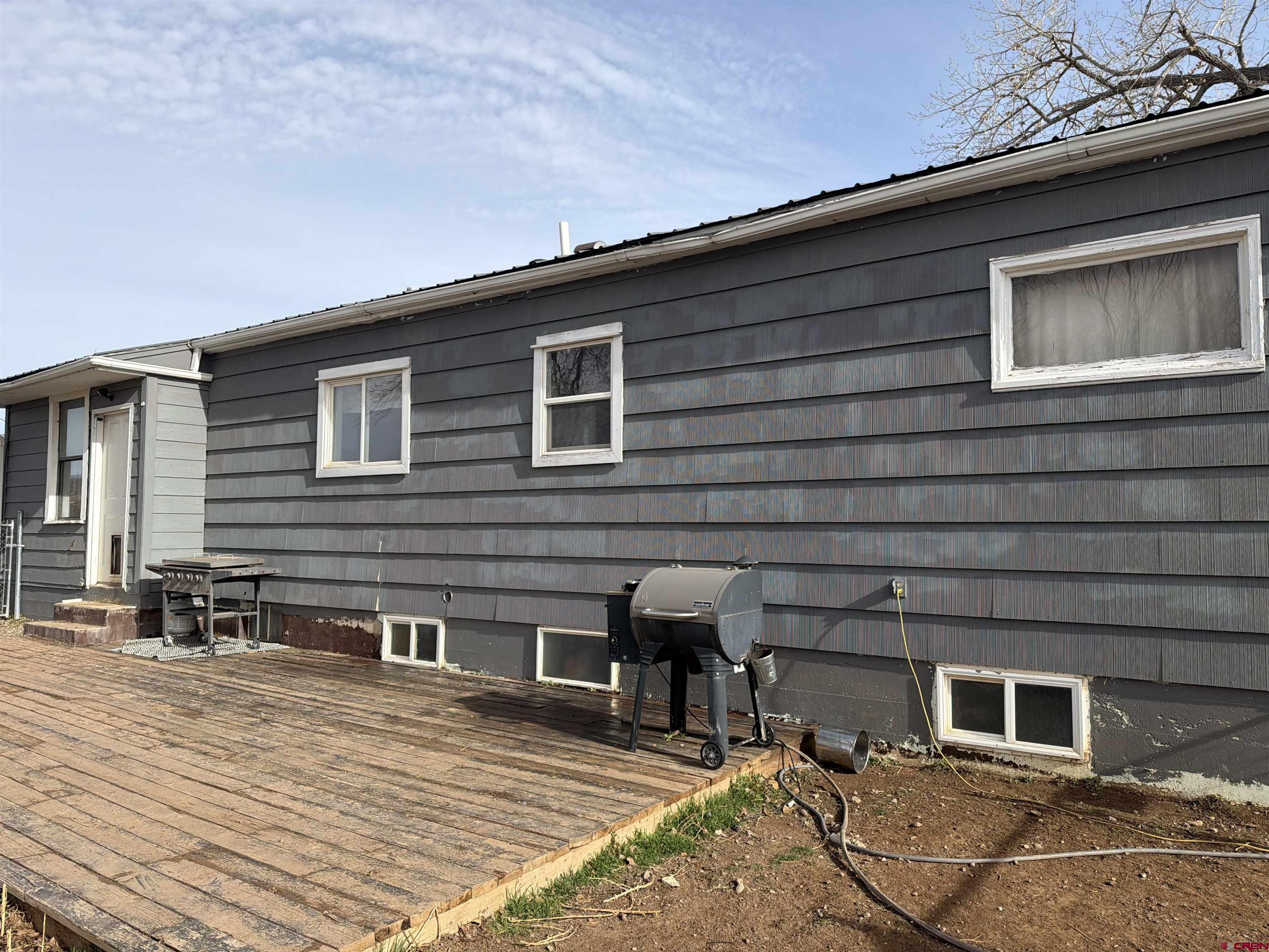 10659 3100th Road Hotchkiss, CO 81419 - Photo 38 of 40 a backyard of a house with seating space