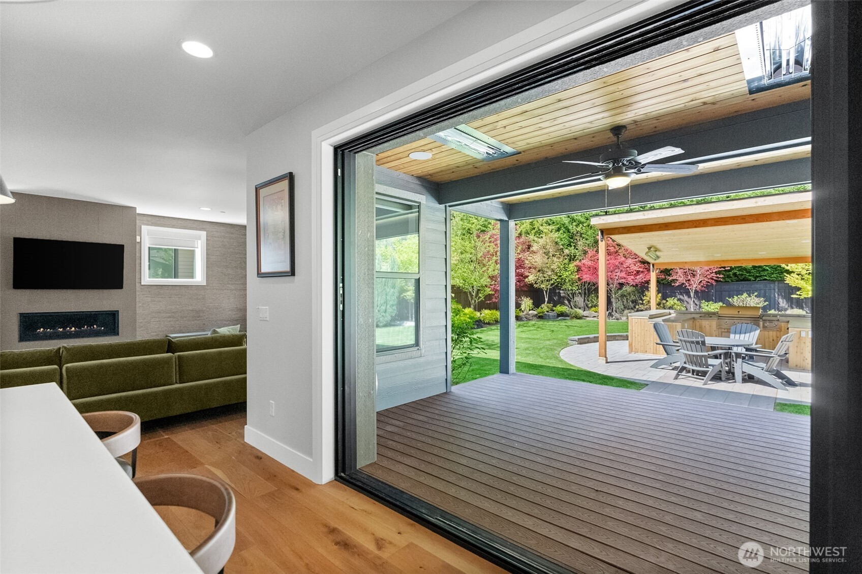 6565 Serenity Loop Gig Harbor, WA 98335 - Photo 17 of 40 a view of a living room and a floor to ceiling window