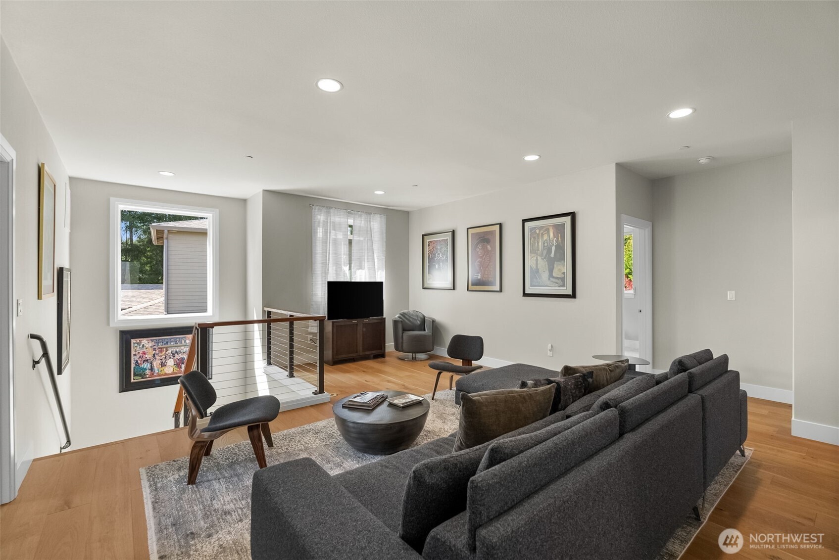 6565 Serenity Loop Gig Harbor, WA 98335 - Photo 20 of 40 a living room with furniture and a window