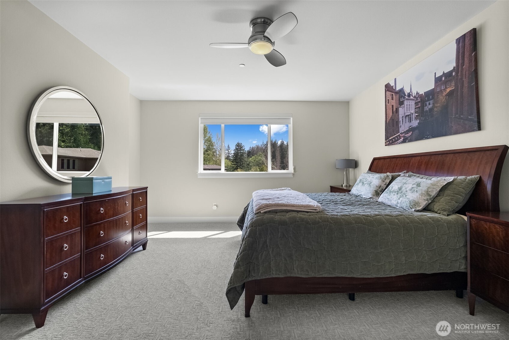 6565 Serenity Loop Gig Harbor, WA 98335 - Photo 25 of 40 a bedroom with a bed and a dresser