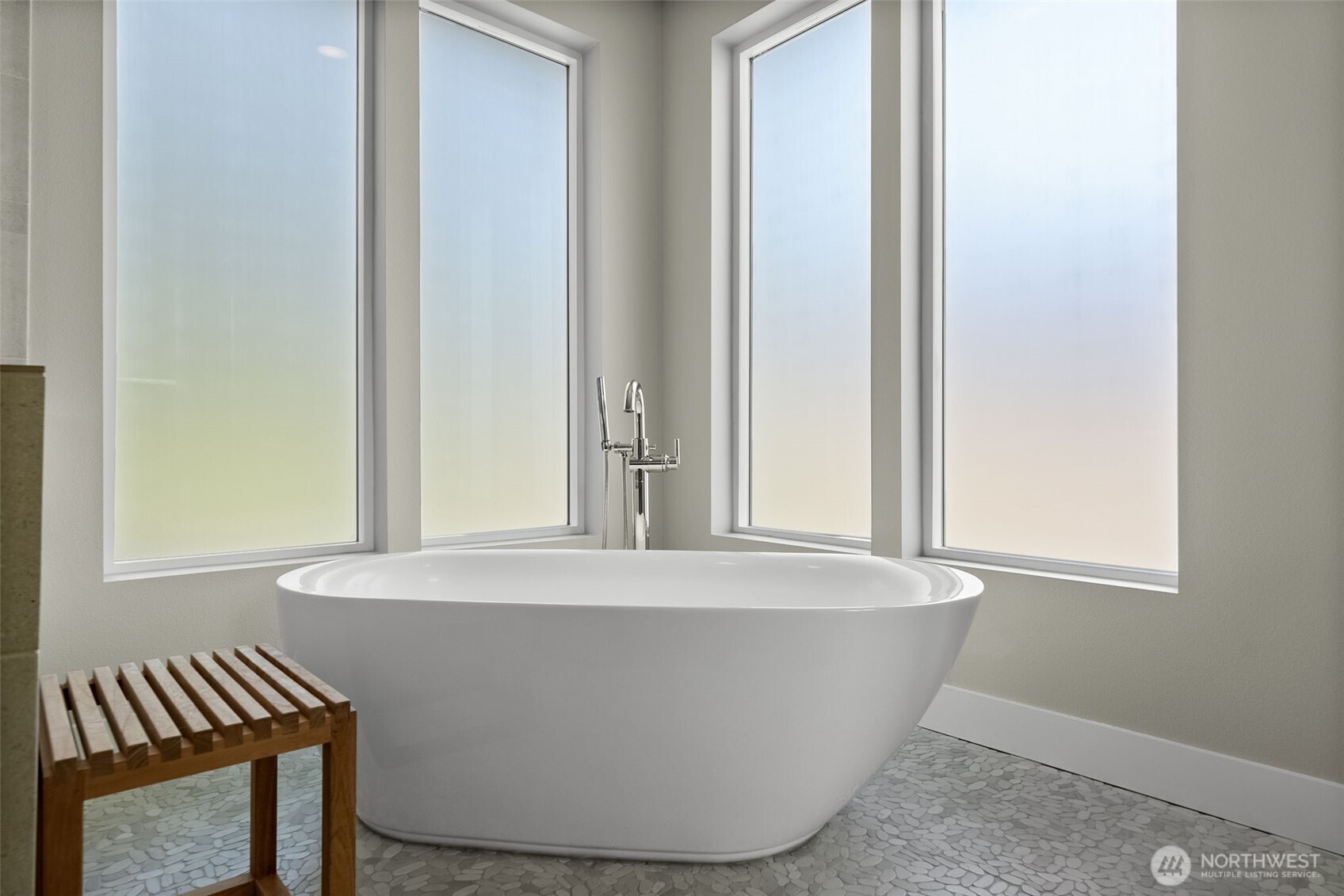 6565 Serenity Loop Gig Harbor, WA 98335 - Photo 28 of 40 a white tub sitting next to a window