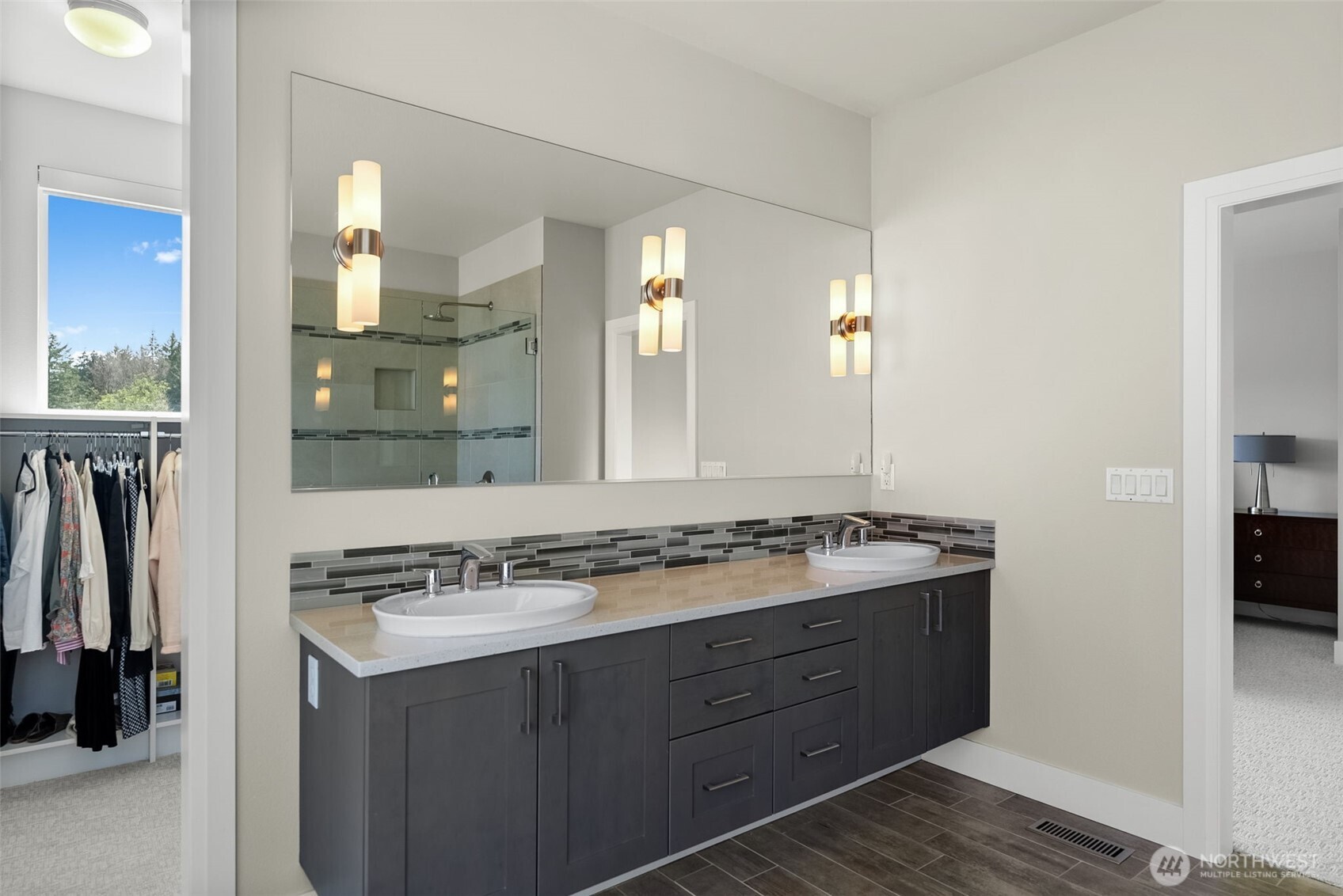 6565 Serenity Loop Gig Harbor, WA 98335 - Photo 29 of 40 a bathroom with a sink and a mirror