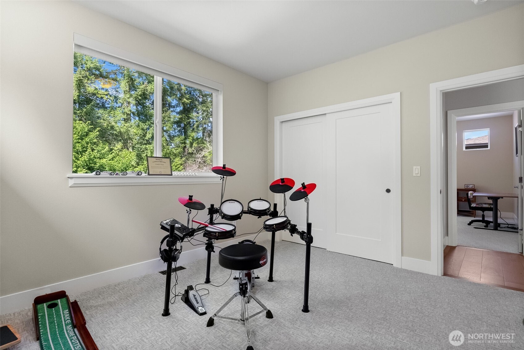 6565 Serenity Loop Gig Harbor, WA 98335 - Photo 31 of 40 a view of a workspace with furniture and a window