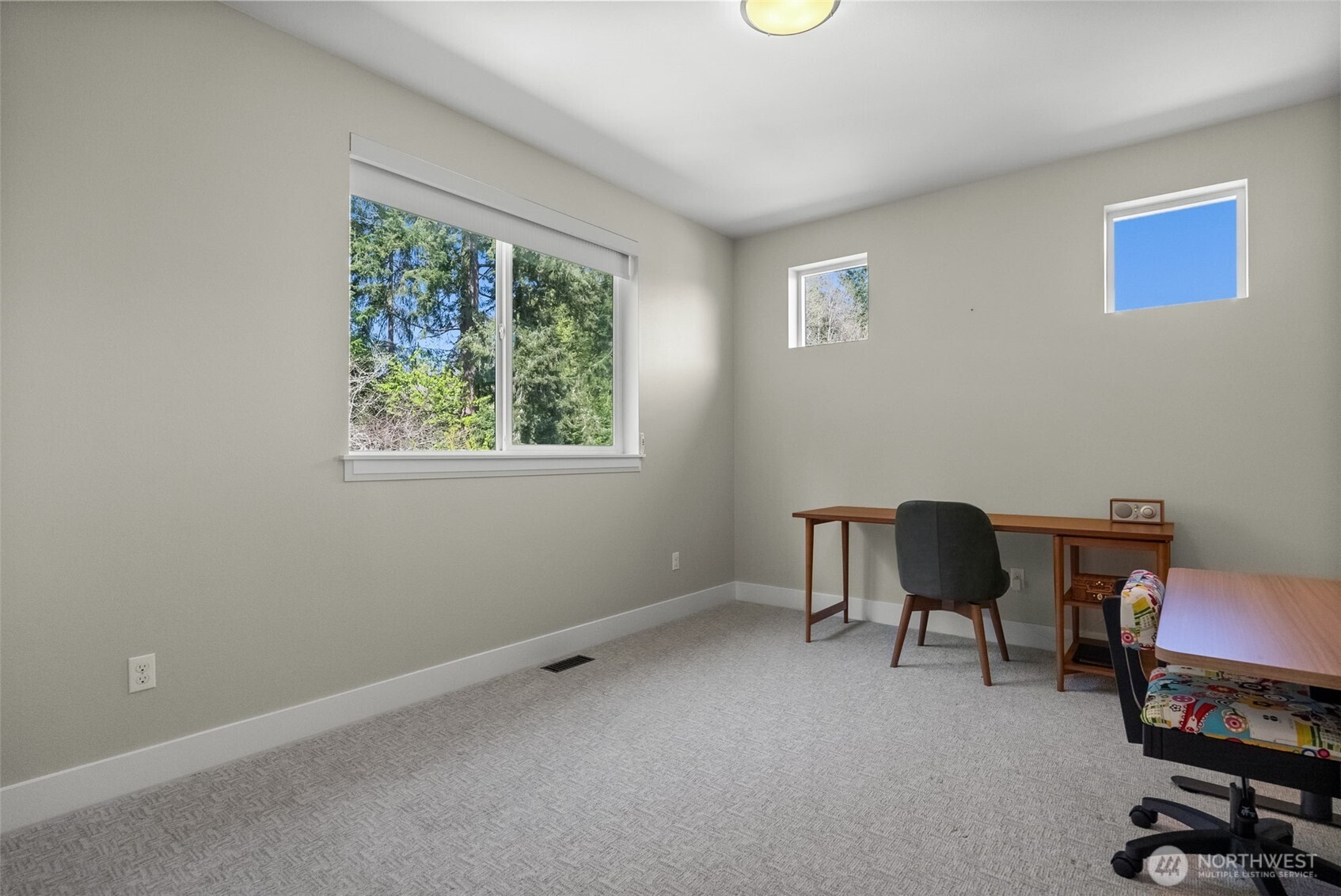 6565 Serenity Loop Gig Harbor, WA 98335 - Photo 32 of 40 a workspace with furniture and a window
