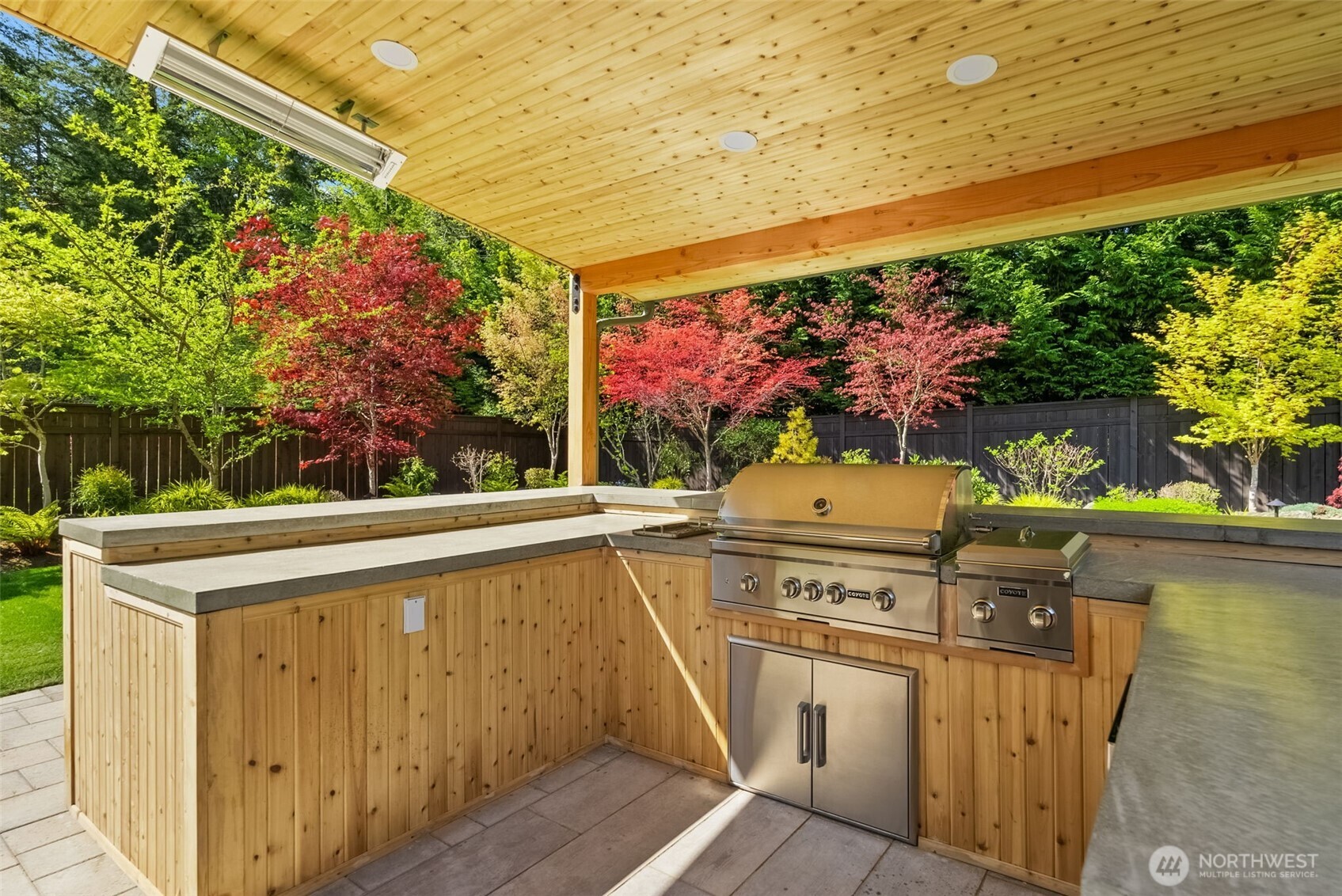 6565 Serenity Loop Gig Harbor, WA 98335 - Photo 34 of 40 a view of a kitchen with a stove