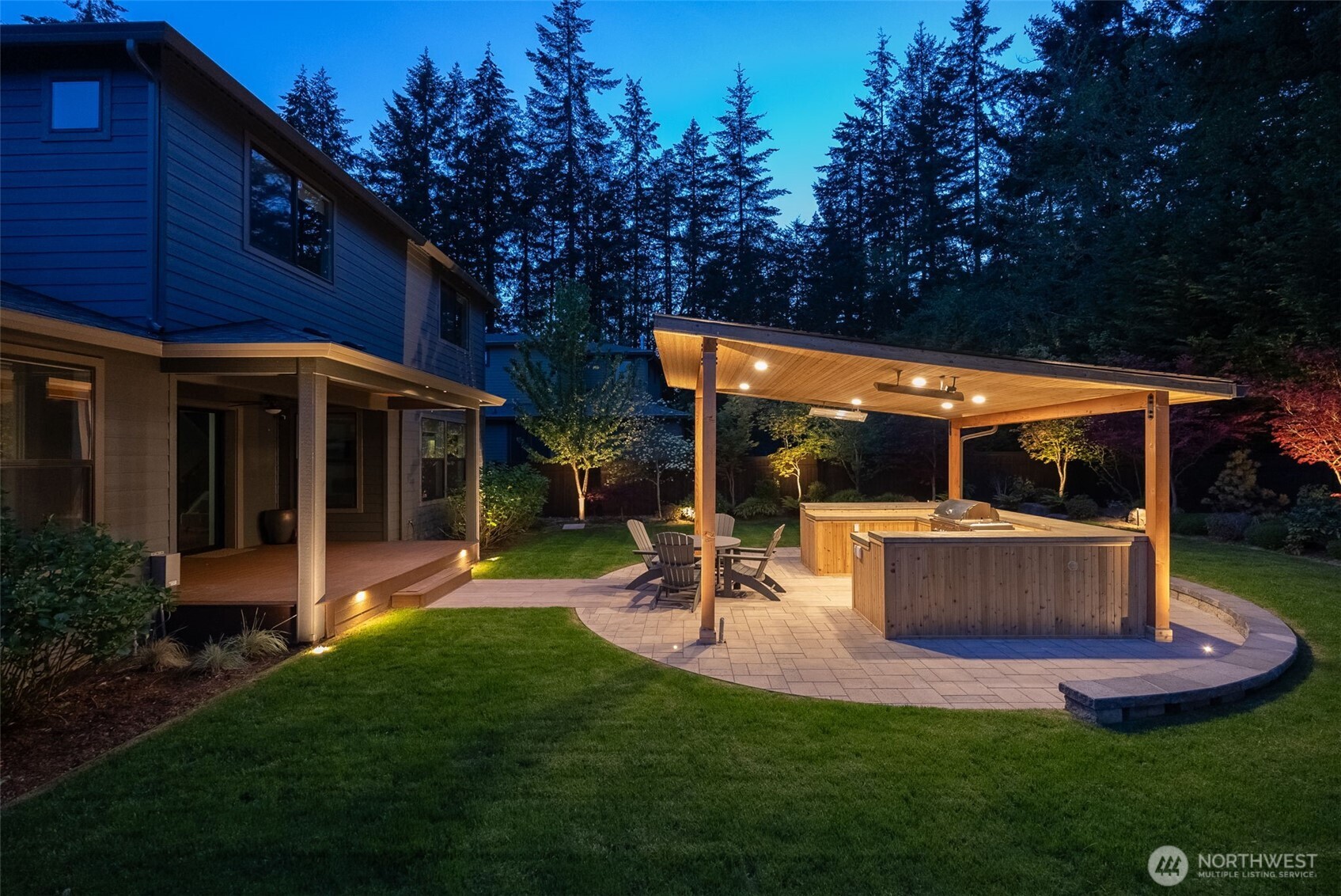 6565 Serenity Loop Gig Harbor, WA 98335 - Photo 36 of 40 a view of a house with backyard porch and sitting area
