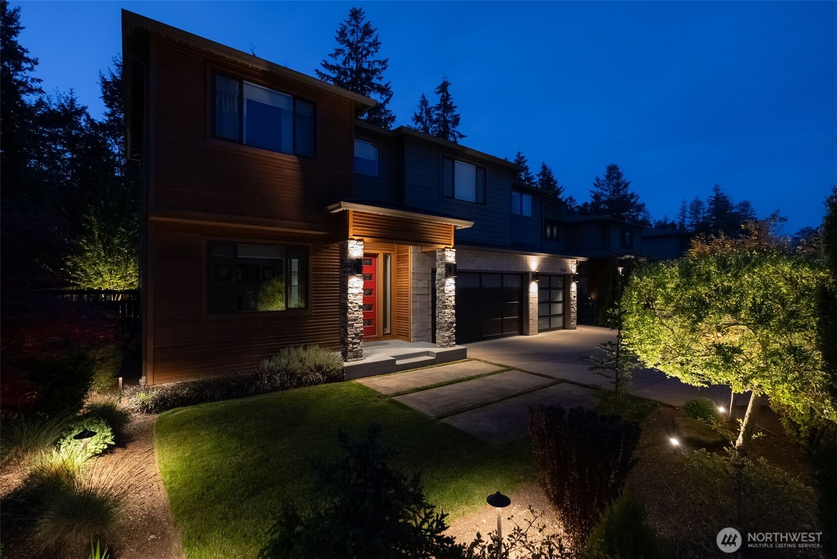 6565 Serenity Loop Gig Harbor, WA 98335 - Photo 37 of 40 a front view of a house with a yard