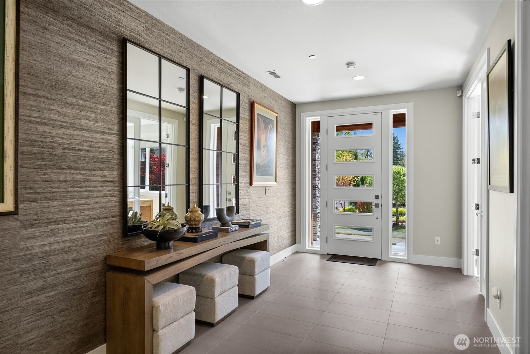 6565 Serenity Loop Gig Harbor, WA 98335 - Photo 4 of 40 a room with furniture and large windows