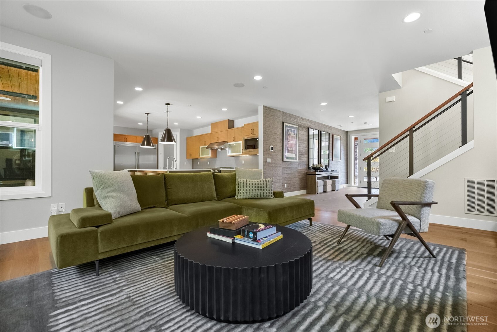 6565 Serenity Loop Gig Harbor, WA 98335 - Photo 8 of 40 a living room with furniture and a couch