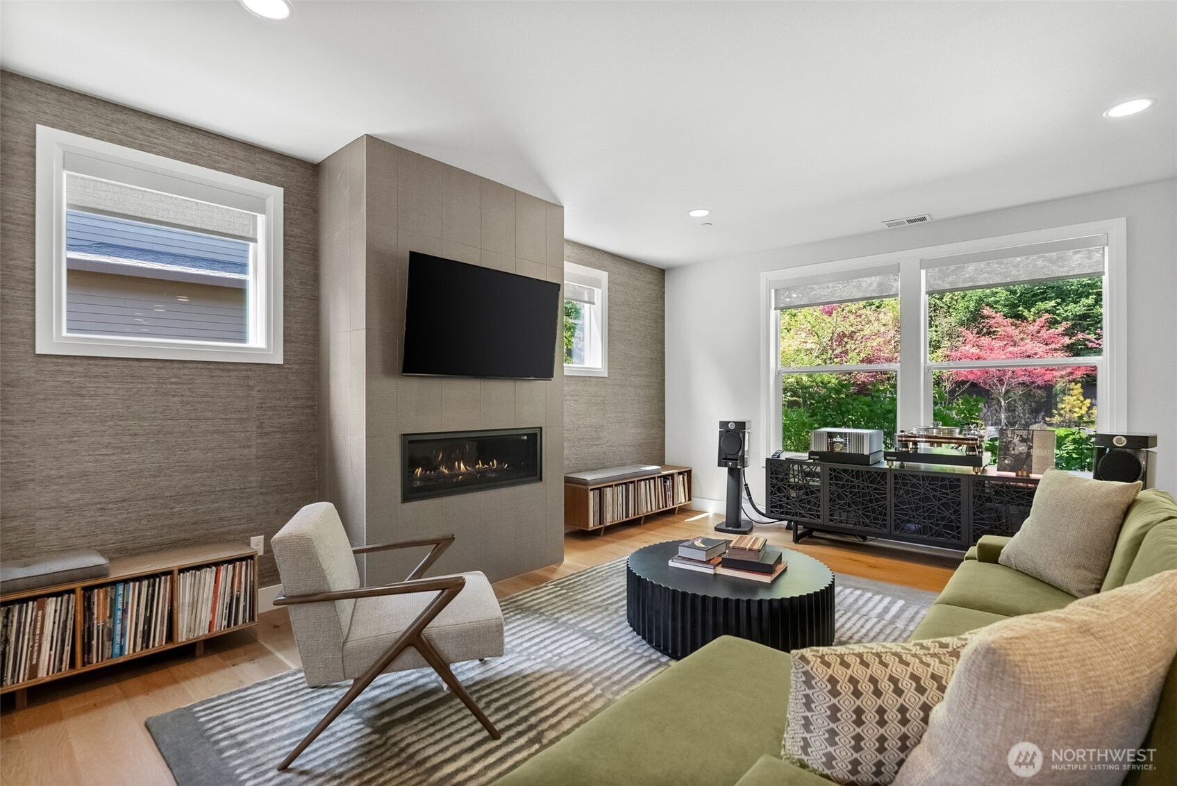6565 Serenity Loop Gig Harbor, WA 98335 - Photo 9 of 40 a living room with furniture and a flat screen tv