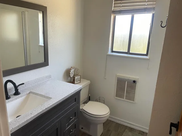 a bathroom with a sink and a toilet
