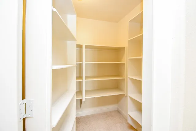 a view of a room with door open