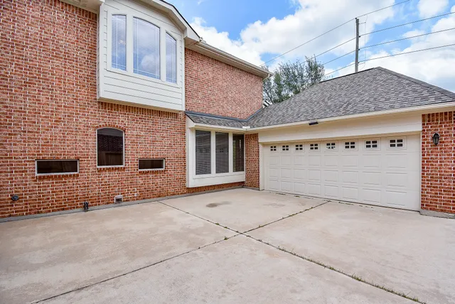 a view of a house with a garage