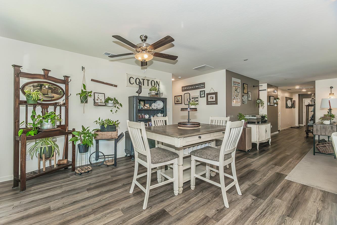 2161 Heidi Avenue Sanger, CA 93657 - Photo 11 of 43 a view of a dining room with furniture window and wooden floor