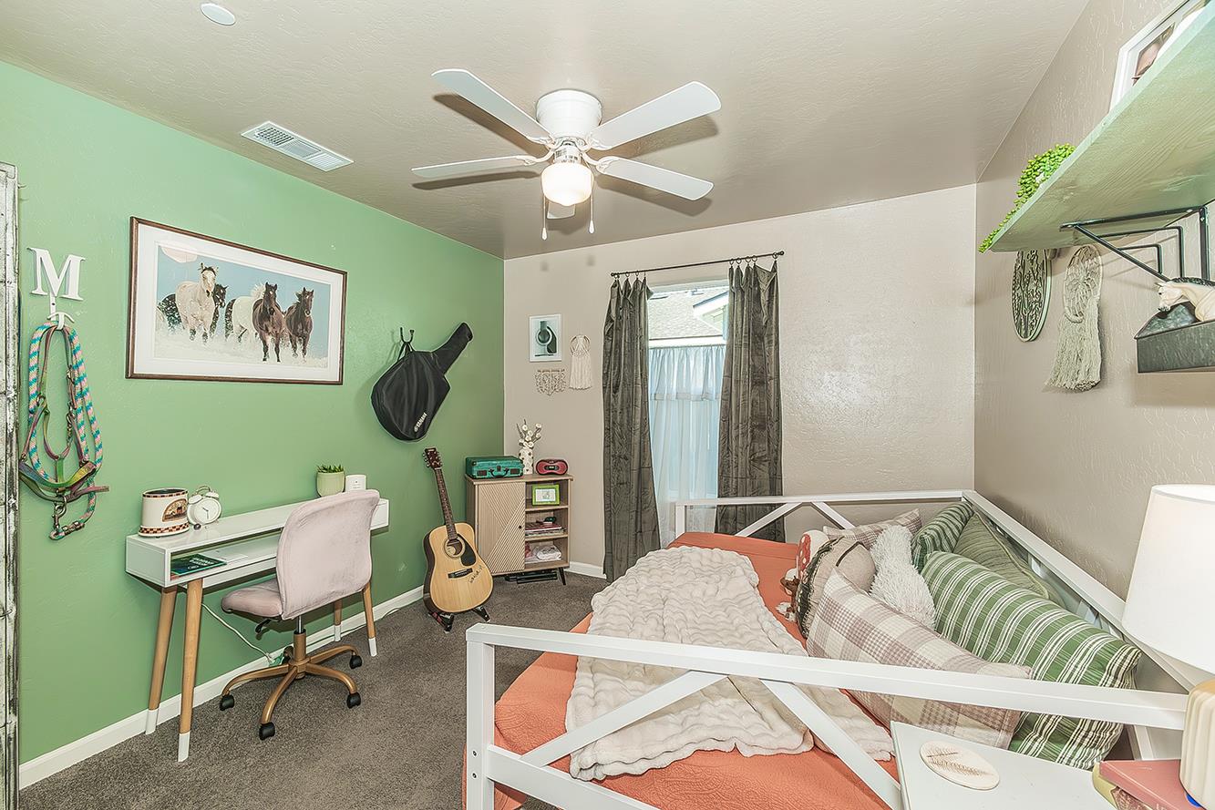 2161 Heidi Avenue Sanger, CA 93657 - Photo 23 of 43 a living room with furniture and a window
