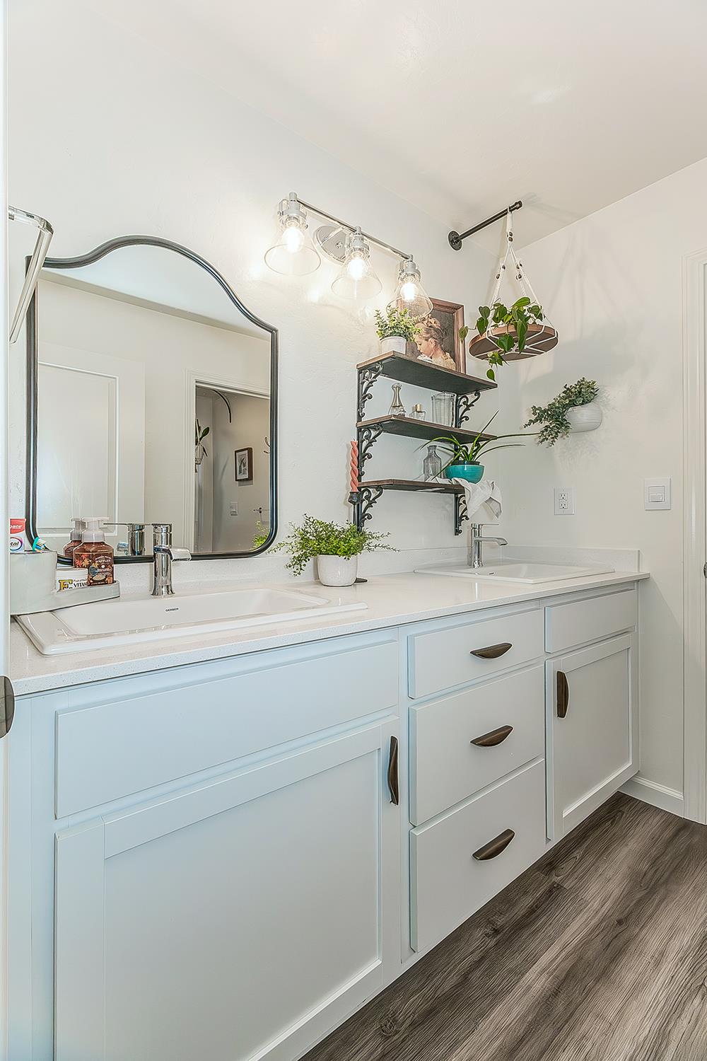 2161 Heidi Avenue Sanger, CA 93657 - Photo 30 of 43 a bathroom with a sink vanity granite and a mirror