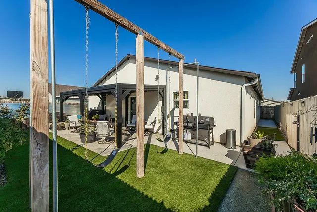 a view of a house with patio