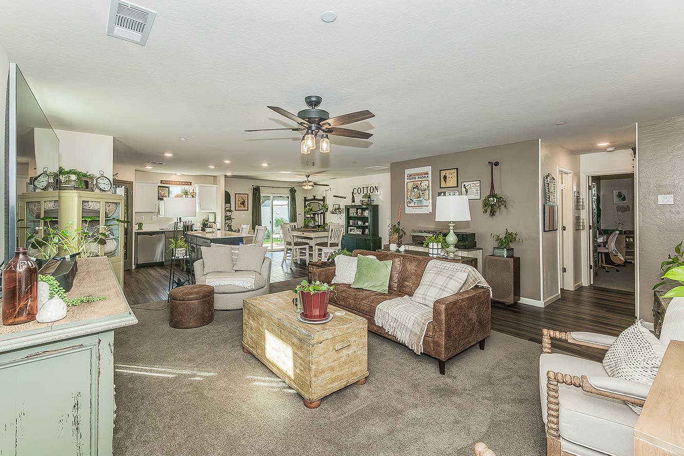 2161 Heidi Avenue Sanger, CA 93657 - Photo 5 of 43 a living room with furniture and a view of kitchen