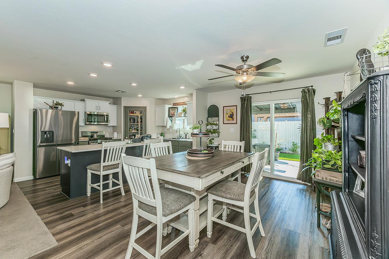 2161 Heidi Avenue Sanger, CA 93657 - Photo 10 of 43 a dining room with furniture and a large window