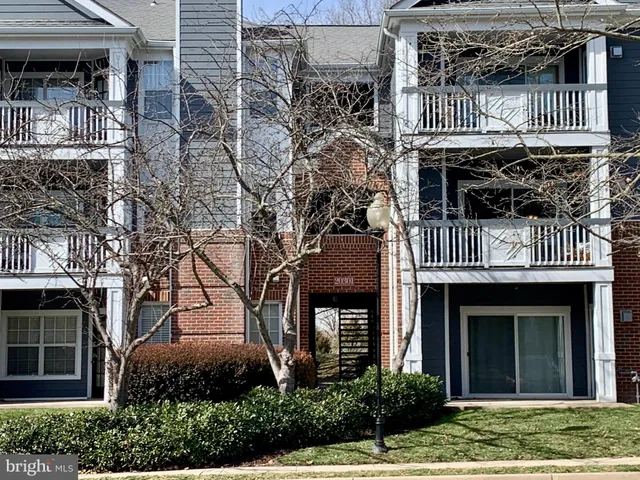 a front view of a house with garage