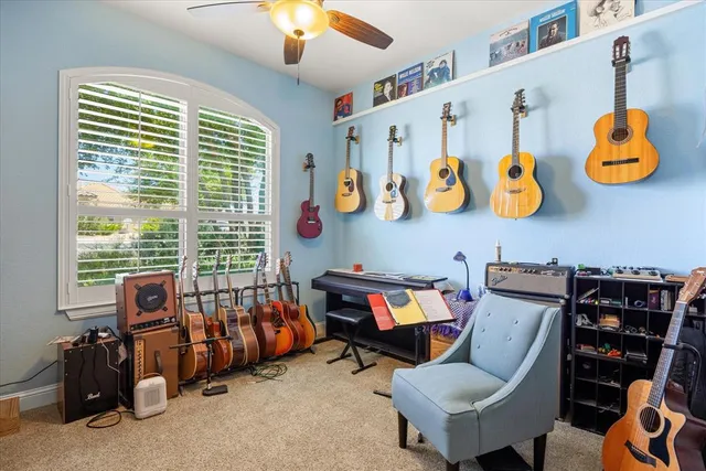 a bedroom with furniture and a window