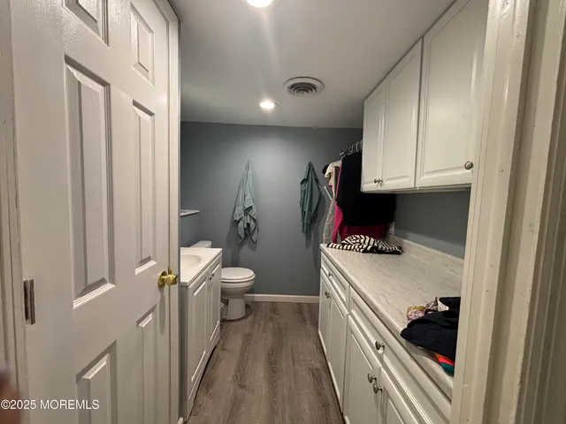a kitchen with a sink and refrigerator