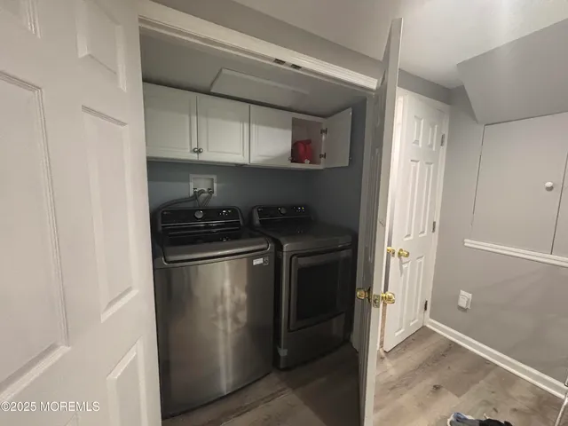 a kitchen with stainless steel appliances granite countertop a refrigerator and a stove