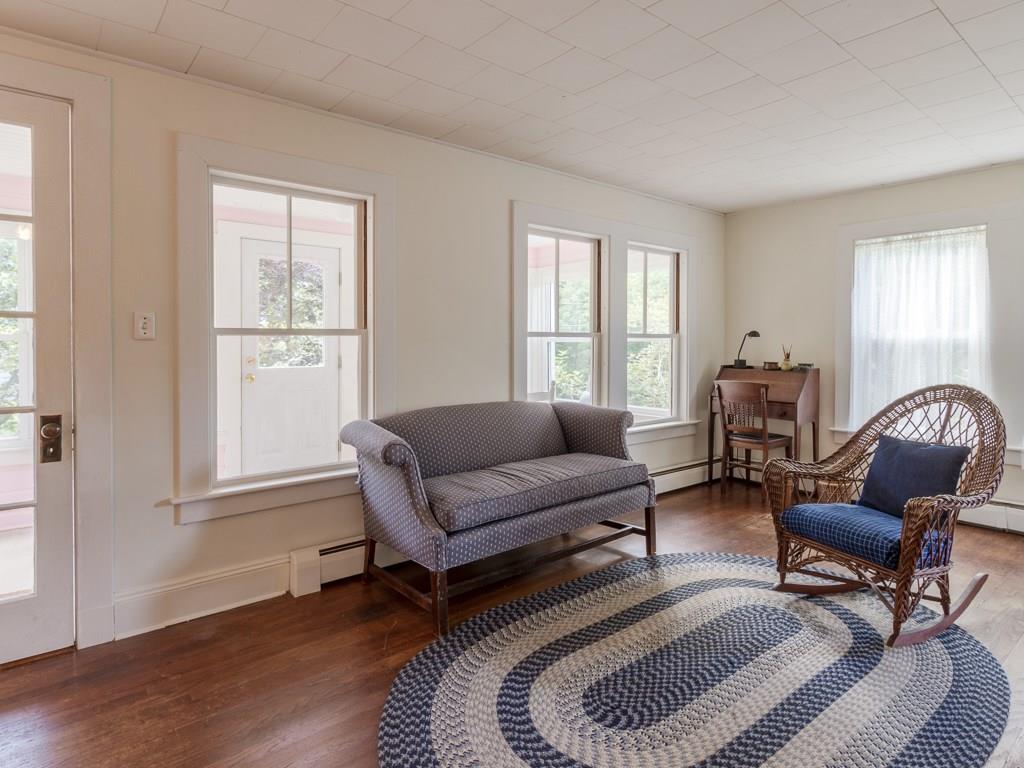 29 Jordan Pond Road Seal Harbor, ME 04675 - Photo 11 of 25 The living room is spacious.